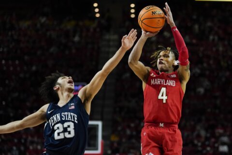 Russell helps Maryland hold off Penn State 67-61