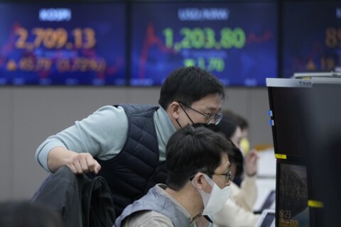 Asian shares shrug off tech-led selloff on Wall Street