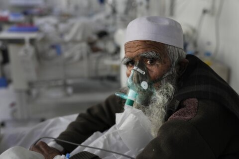 New COVID surge batters Afghanistan’s crumbling health care