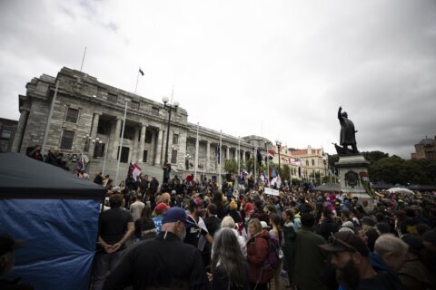 New Zealand's PM signals harsher stance on vaccine protest