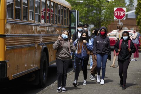 As state mask rules end, school leaders are in the middle