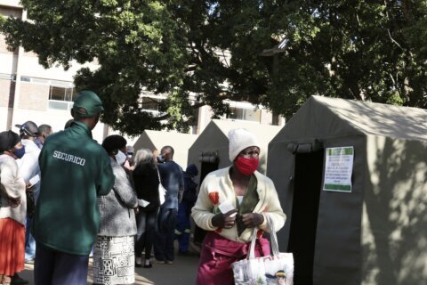 Zimbabwe to stop paying unvaccinated government workers