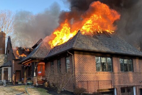 Fire burns Montgomery Co. home for second time in decade, displaces 2 causing millions in damages