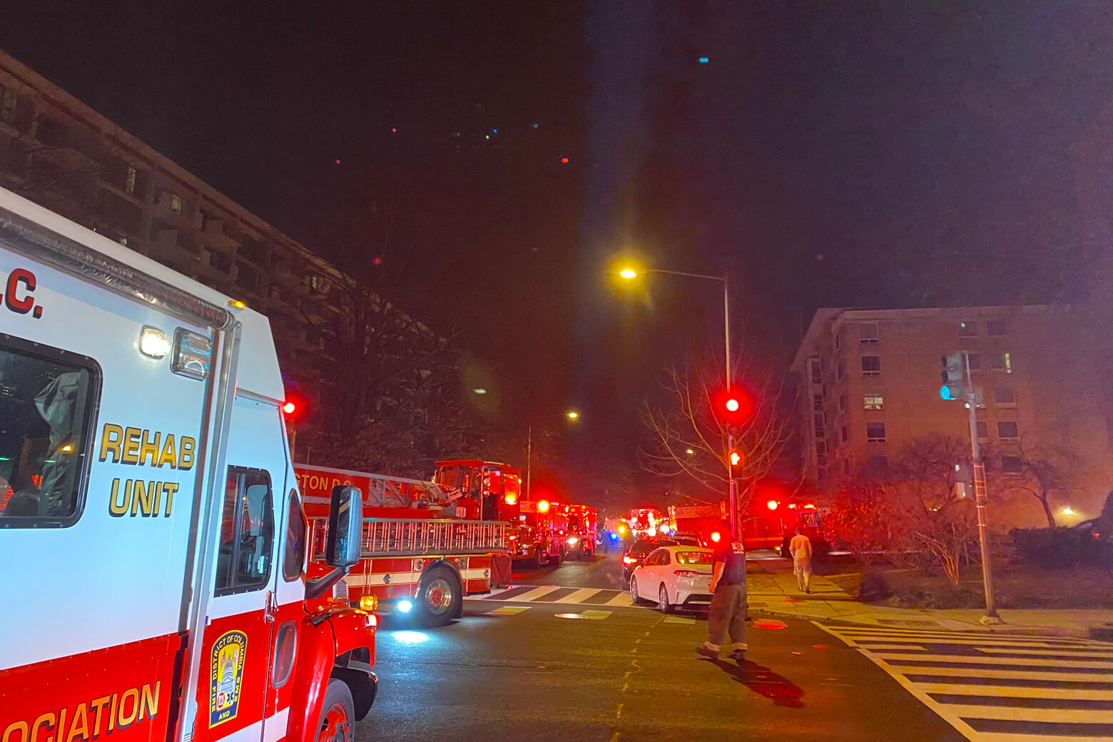 Emergency vehicles are seen at a fire on G Street Feb. 22, 2022. (WTOP/John Domen)