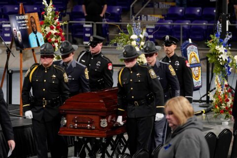 Officers shot on Virginia college campus mourned as heroes