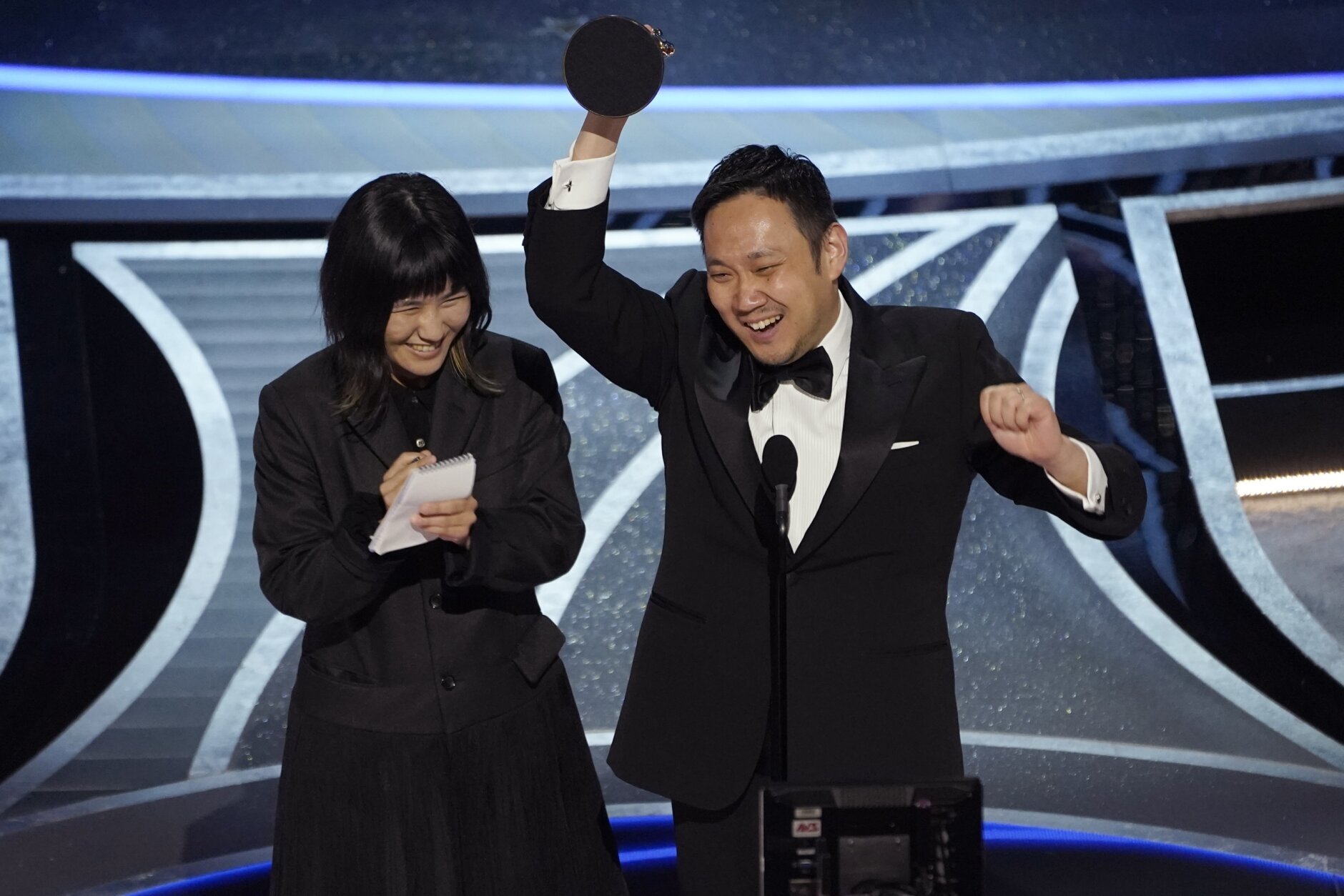 Ryusuke Hamaguchi accepts the award for "Drive My Car," from Japan, for best international feature film at the Oscars on Sunday, March 27, 2022, at the Dolby Theatre in Los Angeles. (AP Photo/Chris Pizzello)