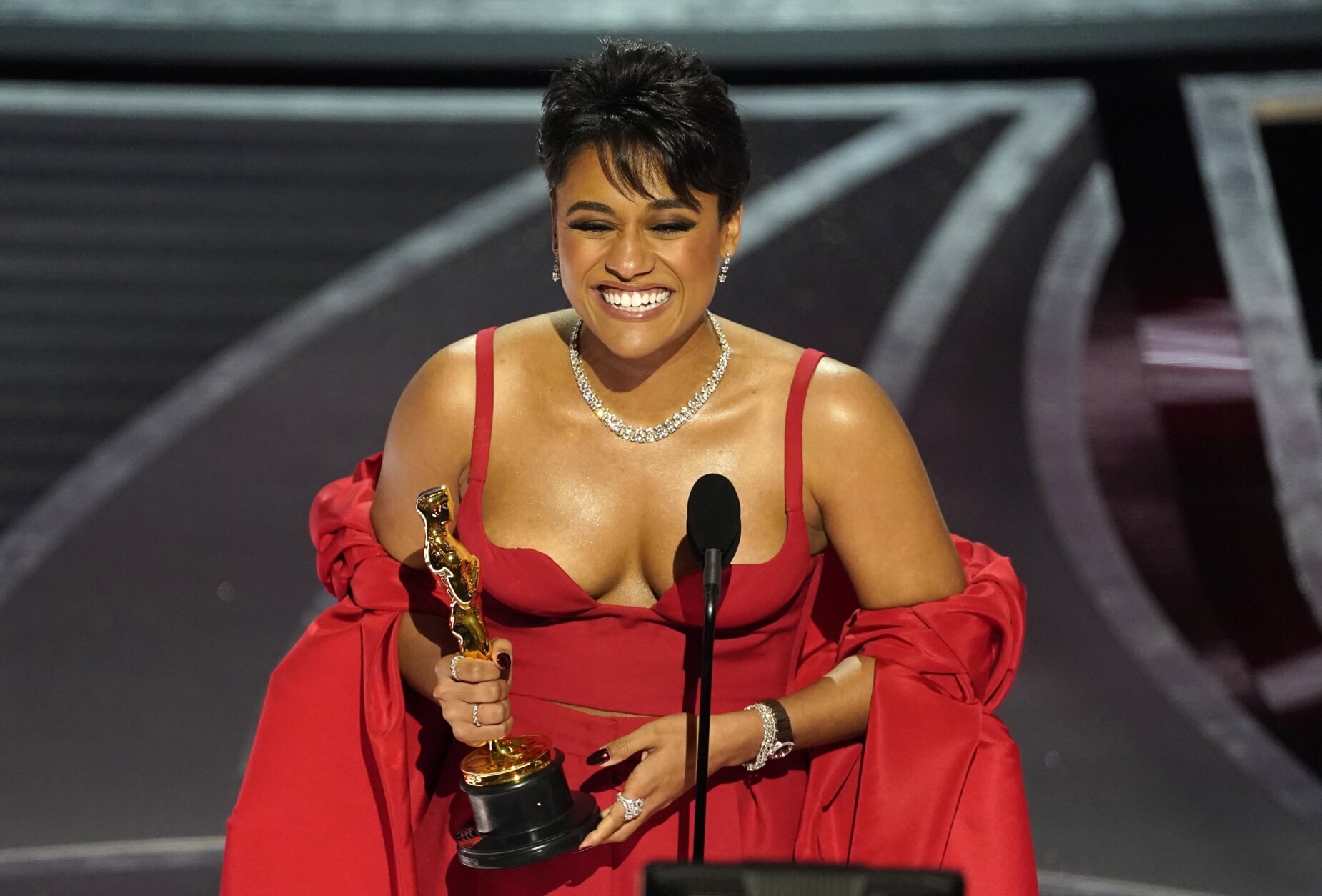 Ariana DeBose accepts the award for best performance by an actress in a supporting role for "West Side Story" at the Oscars on Sunday, March 27, 2022, at the Dolby Theatre in Los Angeles. (AP Photo/Chris Pizzello)