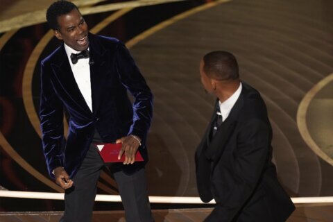 Will Smith confronts Chris Rock, then wins best actor Oscar