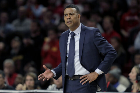 Maryland hires former Rhode Island coach Cox as assistant