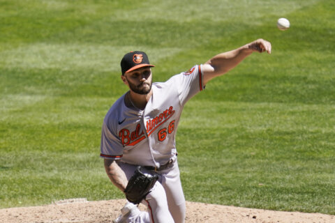 Orioles settle with Scott; no deals with Mancini and Means