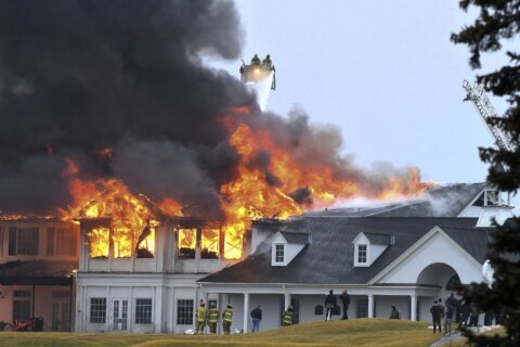 Sheriff: Workers maybe sparked country club fire with torch