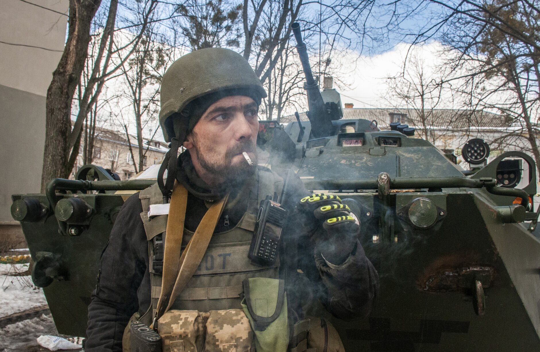 <p>A volunteer of the Ukrainian Territorial Defense Forces stands next to his APC in Kharkiv, Ukraine, Wednesday, March 16, 2022. NATO Secretary-General Jens Stoltenberg made it clear Tuesday that the 30-nation military alliance is set to radically change its security stance in Europe in response to Russia&#8217;s war on Ukraine.</p>
