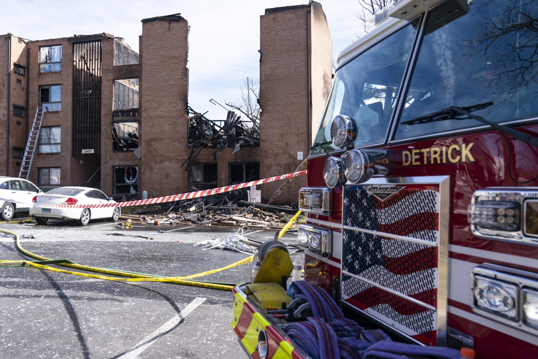 Charred rubble is seen after an apartment building collapsed after an explosion this morning in Silver Spring, Md., Thursday, March, 3, 2022. Montgomery County Fire and Rescue Service reports that multiple people were critically hurt in the fire that started at about 10:30 a.m. at a four-story building at the Friendly Garden Apartments in Silver Spring, Md. (AP Photo/Alex Brandon)