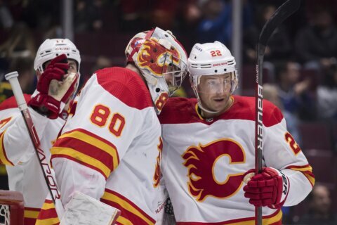 Tkachuk, Andersson lead Flames to 5-2 win over Canucks