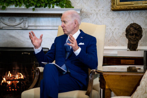 President Biden sitting in chair