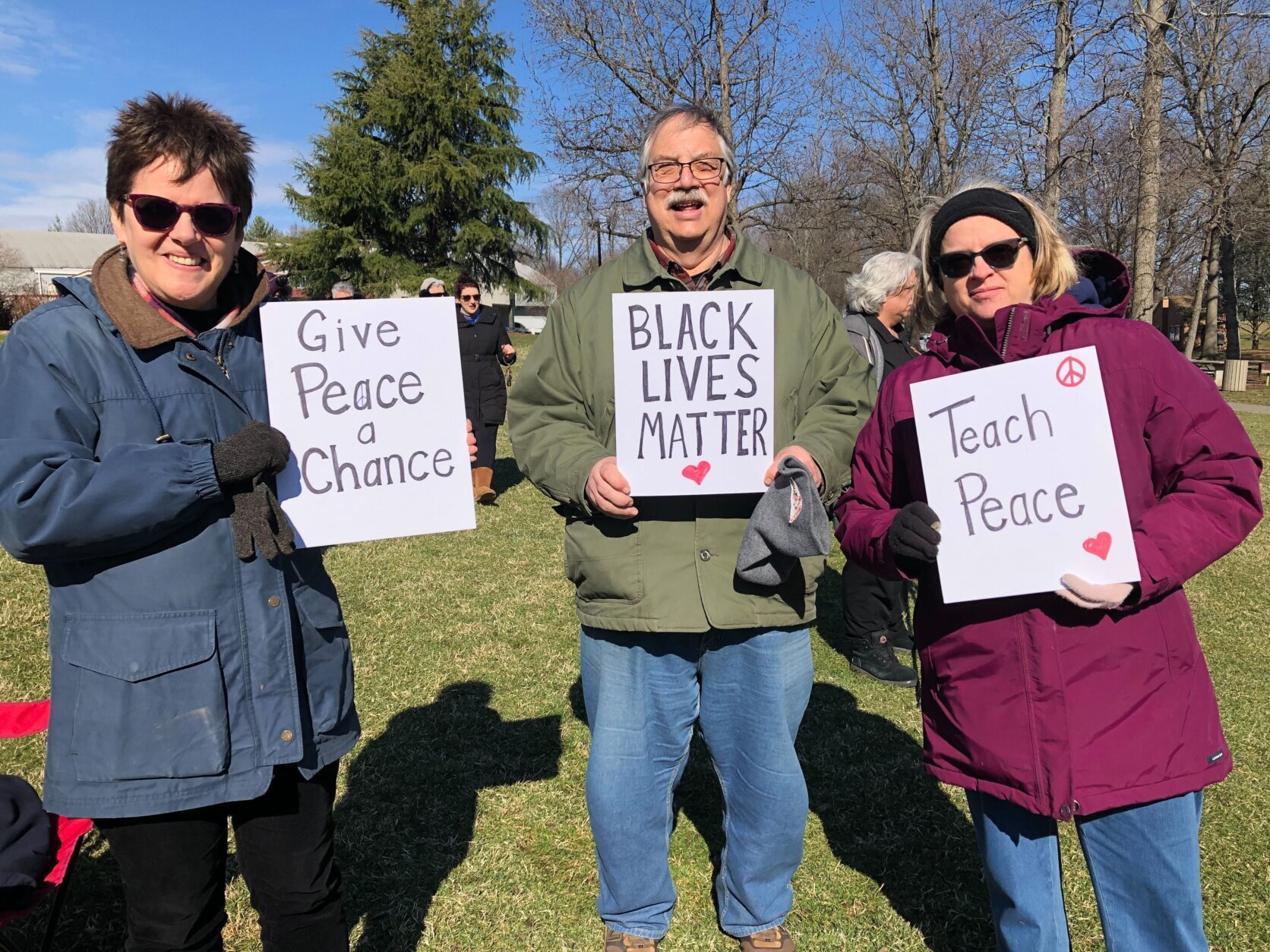 A group gathered in Bowie at Allen Pond Park on Sunday for a peace rally.