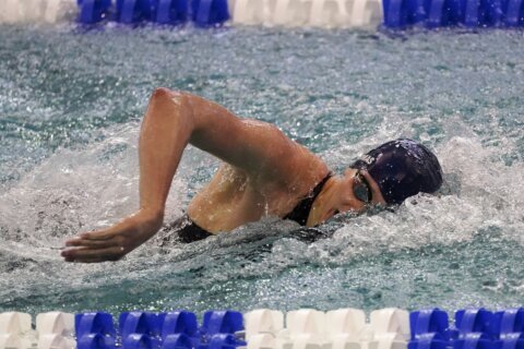 Douglass, Virginia continue to lead swimming championships