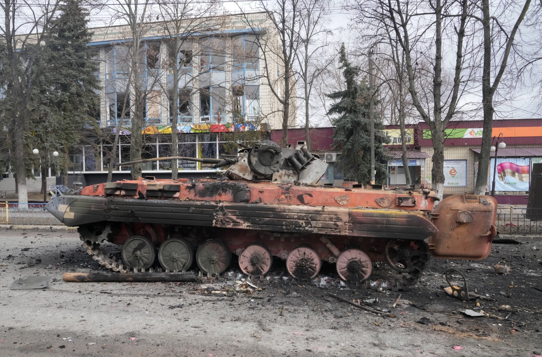 A destroyed armored personnel carrier stands in the central square of the town of Makariv, 60 kilometres west of Kyiv, Ukraine, after a heavy night battle Friday, March 4, 2022. (AP Photo/Efrem Lukatsky)