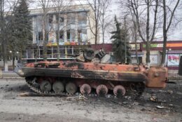 A destroyed armored personnel carrier stands in the central square of the town of Makariv, 60 kilometres west of Kyiv, Ukraine, after a heavy night battle Friday, March 4, 2022. (AP Photo/Efrem Lukatsky)