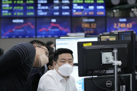 Asian shares slip as Japan 'tankan' shows weaker outlook