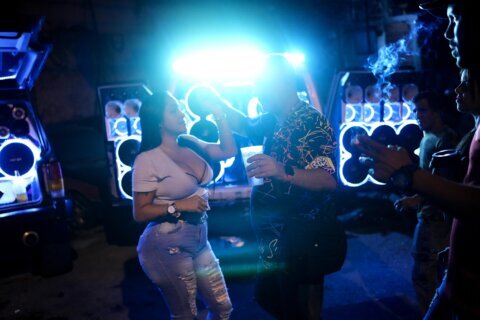 Customized cars, SUVs take parties on the road in Venezuela