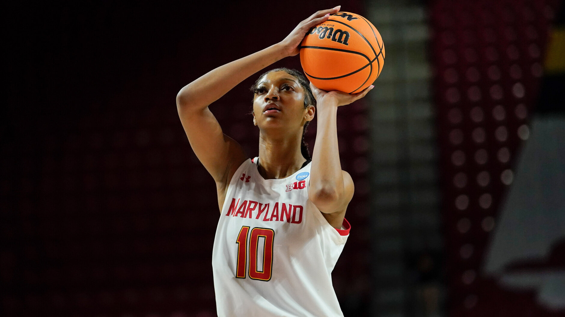 Maryland forward Angel Reese shoots against Delaware during the second half of a college basketball game in the first round of the NCAA tournament, Friday, March 18, 2022, in College Park, Md. Maryland won 102-71. (AP Photo/Julio Cortez)