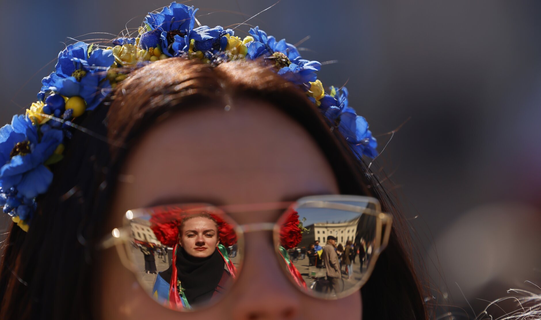 People attend a pro-Ukrainian protest under the slogan "March for true Peace in Ukraine", in Berlin, Germany, Saturday, April 16, 2022. (AP Photo/Hannibal Hanschke)