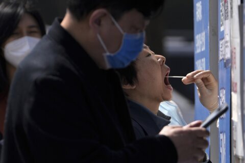 COVID outbreak ‘extremely grim’ as Shanghai extends lockdown