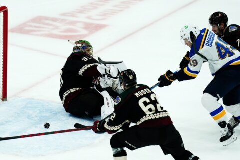 Blues beat Coyotes 5-4 in overtime after blowing big leads