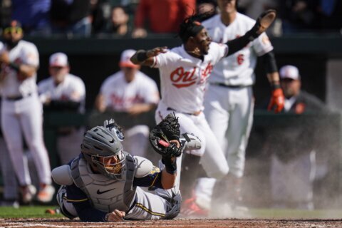 Orioles blank Brewers 2-0 in home opener at Camden Yards