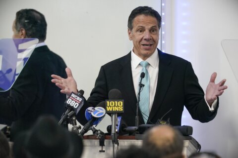 Cuomo files suit against NY ethics board over book profits