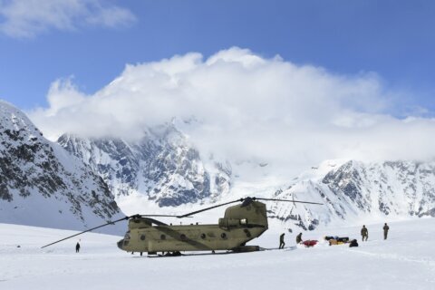 US Army Chinook helicopters help set up base camp on Denali