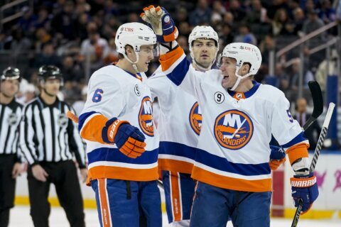 Barzal, Varlamov help Islanders beat rival Rangers 3-0