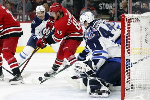 Jarvis helps Hurricanes rally from 2 down to beat Jets 4-2