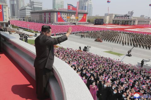 North Korea’s Kim attends parade honoring grandfather