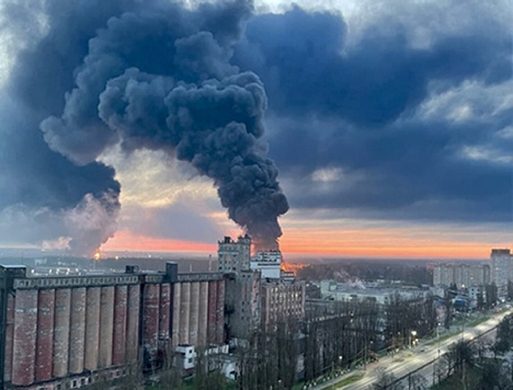 In this photo taken by an anonymous source, smoke rises from oil storage facilities hit by fire in Bryansk, Russia, Monday, April 25, 2022. The Emergencies Ministry said the massive fire at the depot in the city of Bryansk erupted overnight. The oil depot is owned by Transneft-Druzhba, a subsidiary of the Russian state-controlled company Transneft that operates the western-bound Druzhba (Friendship) pipeline carrying crude to Europe, and it wasn't immediately clear if the blaze could affect the deliveries. (Anonymous source via AP)