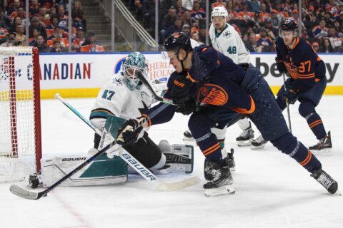 Hyman scores in overtime, Oilers rally to beat Sharks 5-4