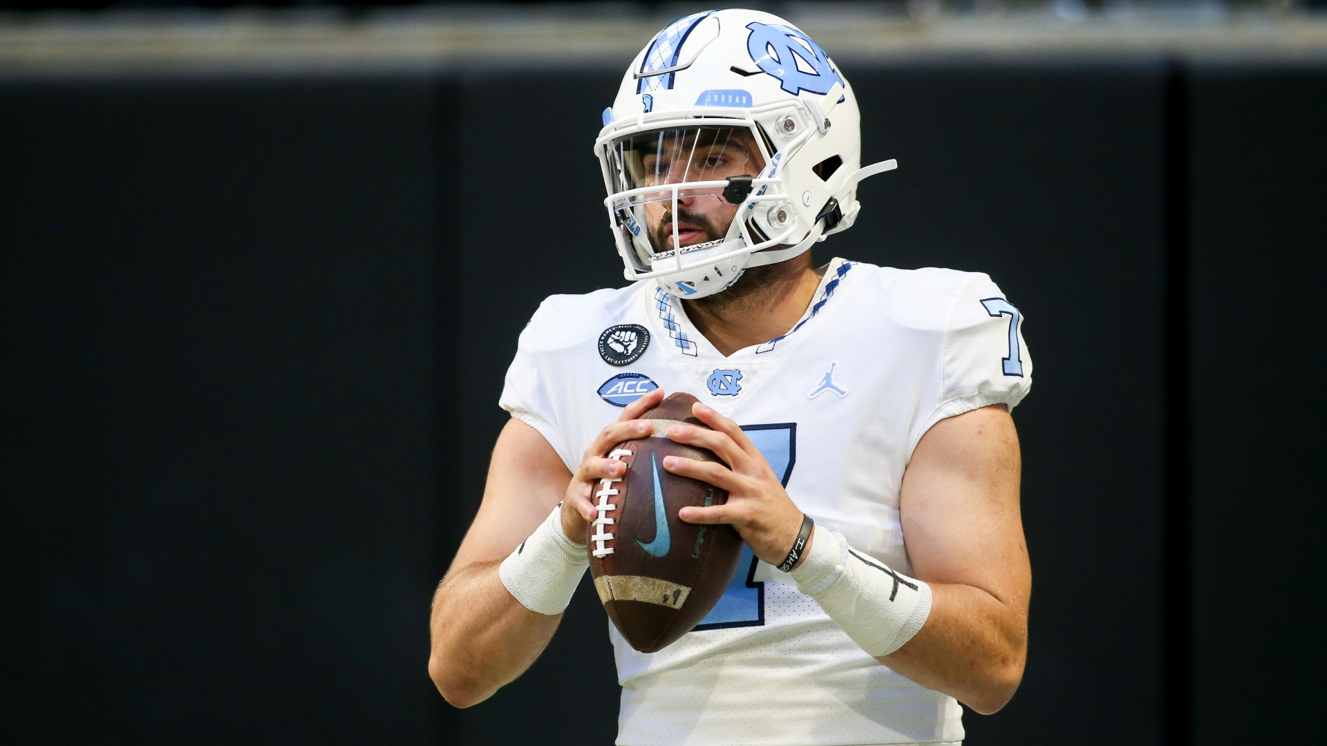 Washington Commanders quarterback Sam Howell (14) warms up prior to the  start of an NFL pre-season football game against the Cleveland Browns,  Friday, Aug. 11, 2023, in Cleveland. (AP Photo/Kirk Irwin Stock