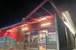 <p>A Mobil gas station in Tysons saw roof damage after a powerful storm blew through on March 31, 2022.</p>
