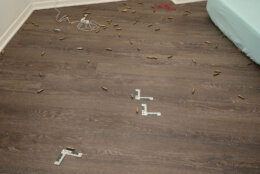 Shell casings litter the floor of the the sniper's apartment (Courtesy D.C. police)