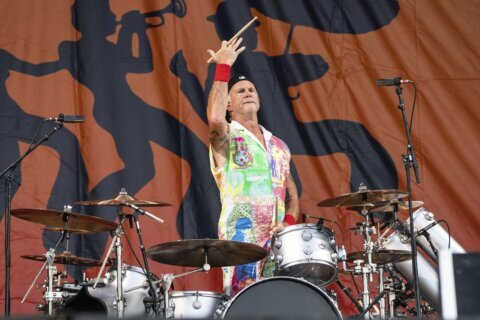 Chili Peppers honor Foo Fighters drummer at Jazz Fest