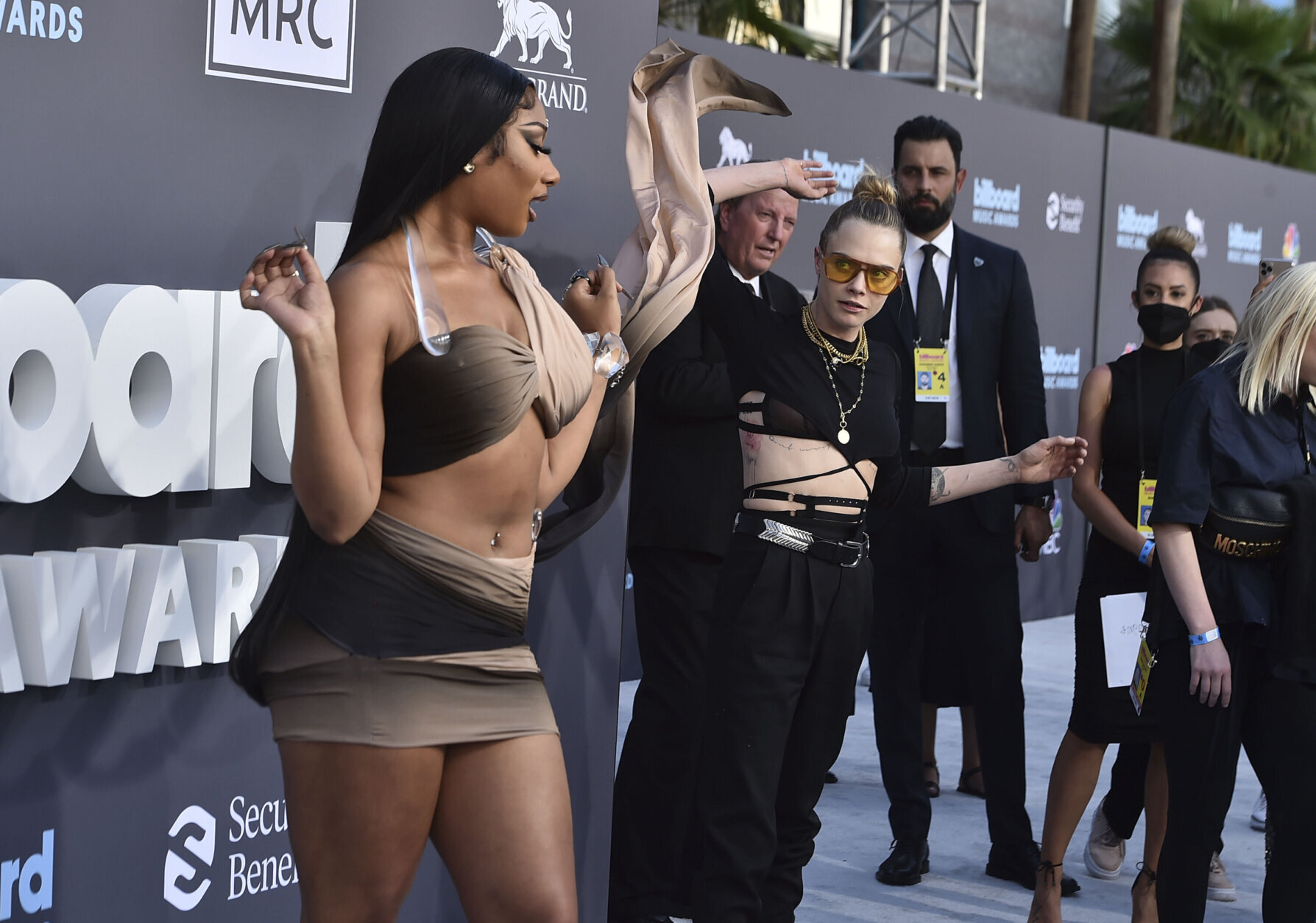 Megan Thee Stallion, left, and Cara Delevingne arrive at the Billboard Music Awards on Sunday, May 15, 2022, at the MGM Grand Garden Arena in Las Vegas. (Photo by Jordan Strauss/Invision/AP)