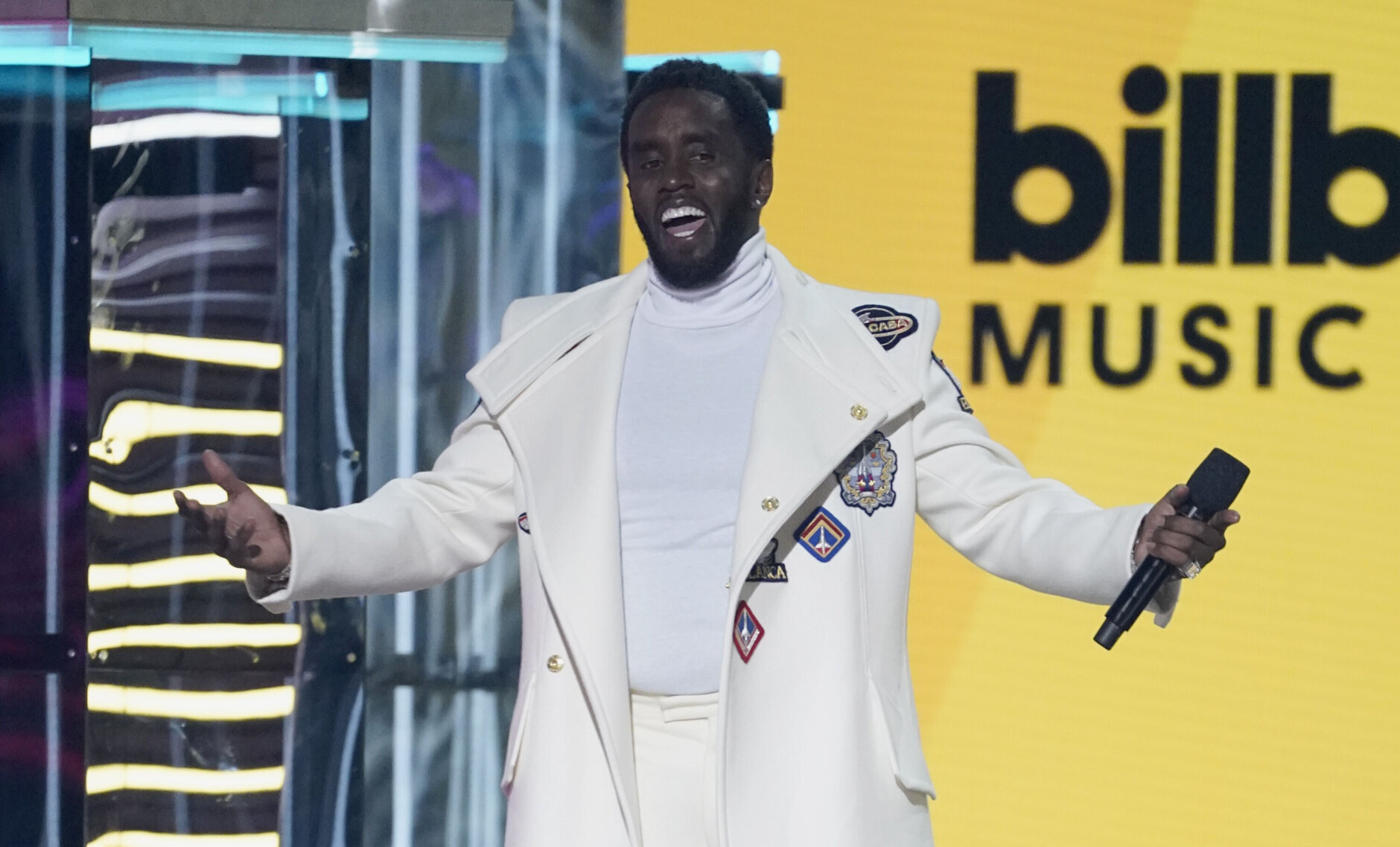 Host Sean "Diddy" Combs speaks at the Billboard Music Awards on Sunday, May 15, 2022, at the MGM Grand Garden Arena in Las Vegas. (AP Photo/Chris Pizzello)
