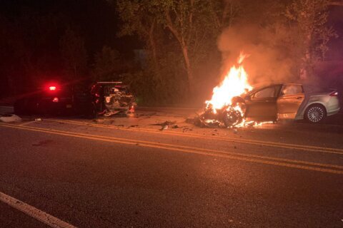Suspected impaired driver rescued from burning car in Beltsville crash; trooper injured