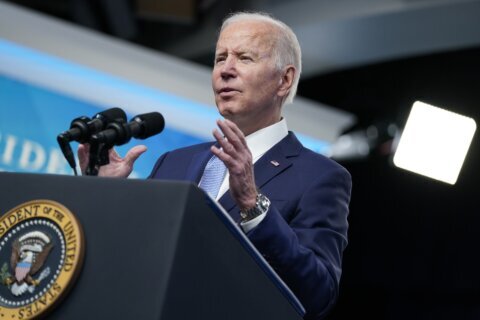 Biden showcases deficit progress in bid to counter critics