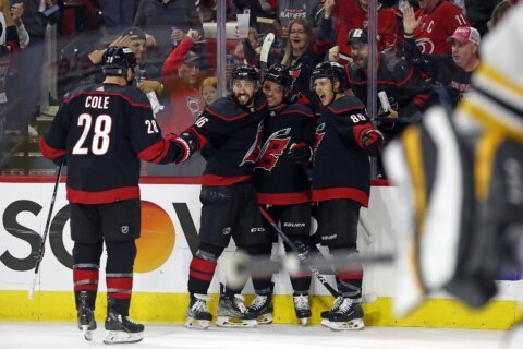 Domi, Raanta help Hurricanes close out Bruins 3-2 in Game 7