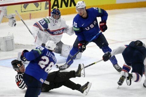 US qualifies for hockey worlds quarterfinals, to face Swiss