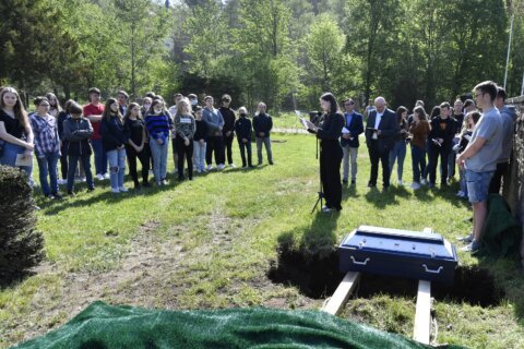 Peace at last: German students bury classroom skeleton