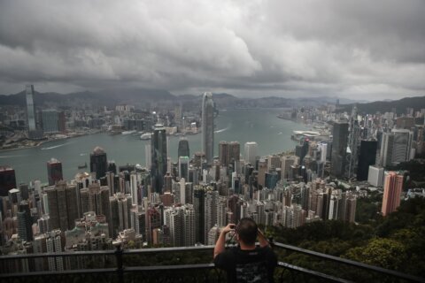 Hong Kong economy shrinks 4% under anti-virus controls