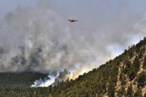 Fire crews close in around massive New Mexico wildfire